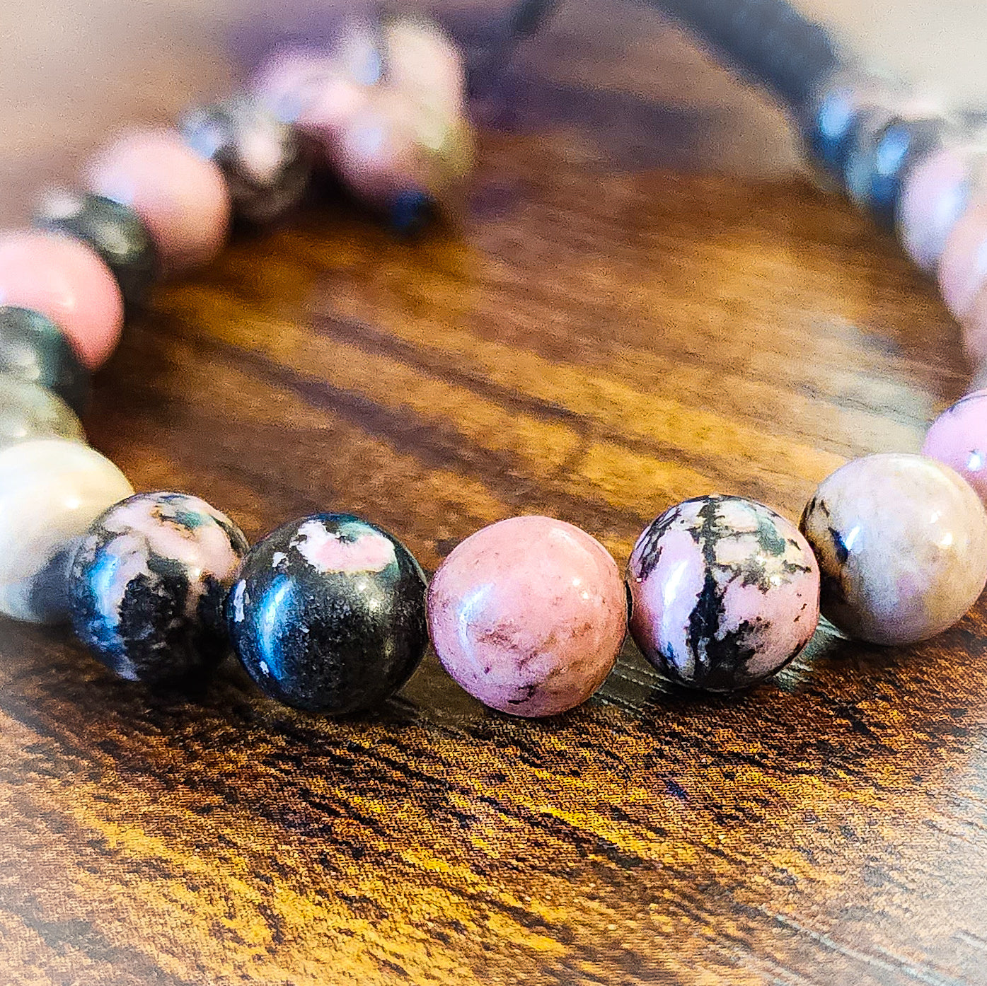 Natural Pink Black Rhodonite Stone Bracelet for Love – The “Stone of Grace and Elegance”